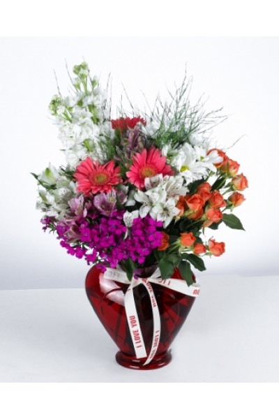 Aşkın Zarafeti: Kırmızı Kalp Vazoda Renkli Çiçek Aranjmanı Aşkın Zarafeti: Kırmızı Kalp Vazoda Renkli Çiçek Aranjmanı